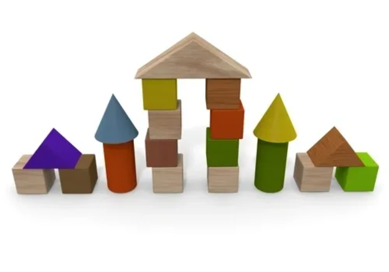 Colorful wooden blocks arranged in a house-like structure.