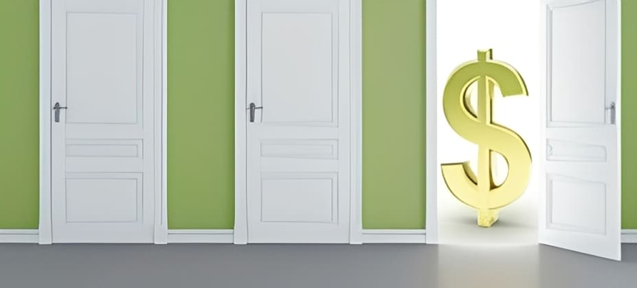 A closed white door set in a green wall with a modern floor lamp nearby.